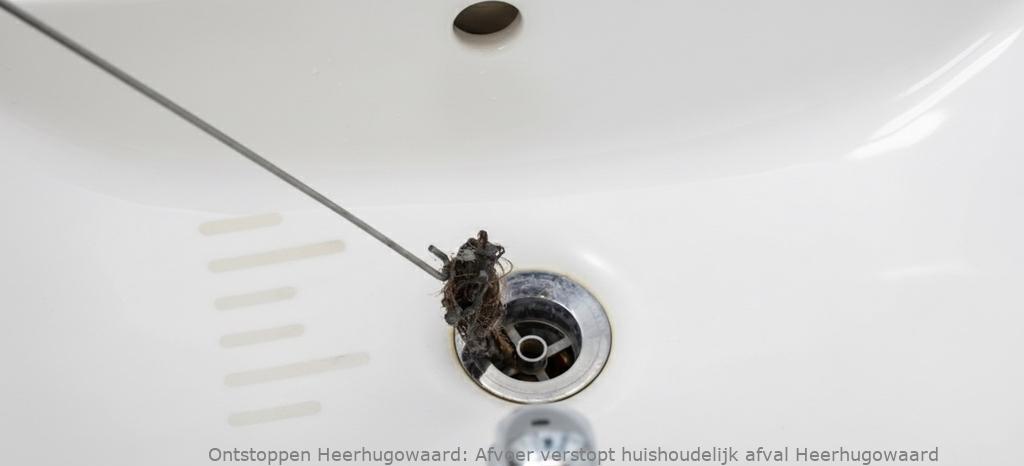 Afvoer verstopt huishoudelijk afval Heerhugowaard